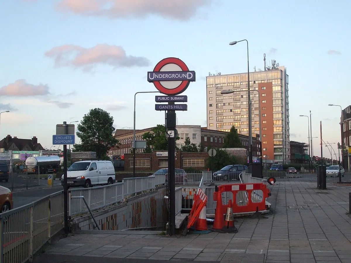 Gants Hill tube station southwest entrance, with the newly refurbished City Gate House tower block (now residential) in the background.